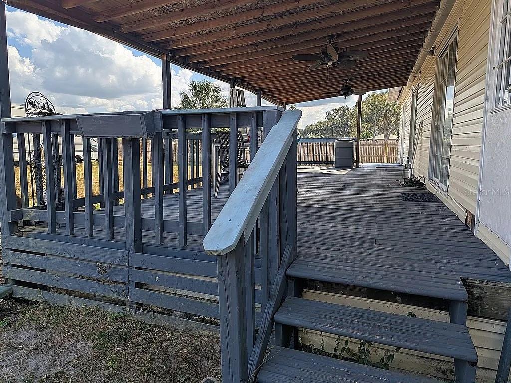 4402 Gallagher Road Plant City, FL 33565 - Photo 31 of 42 a view of entryway with wooden floor