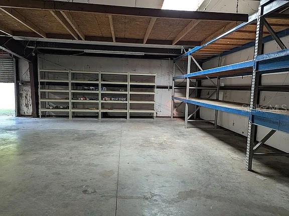 4402 Gallagher Road Plant City, FL 33565 - Photo 35 of 42 a view of an empty room with wooden walls