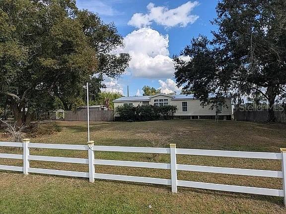 4402 Gallagher Road Plant City, FL 33565 - Photo 38 of 42 a view of a house with a yard