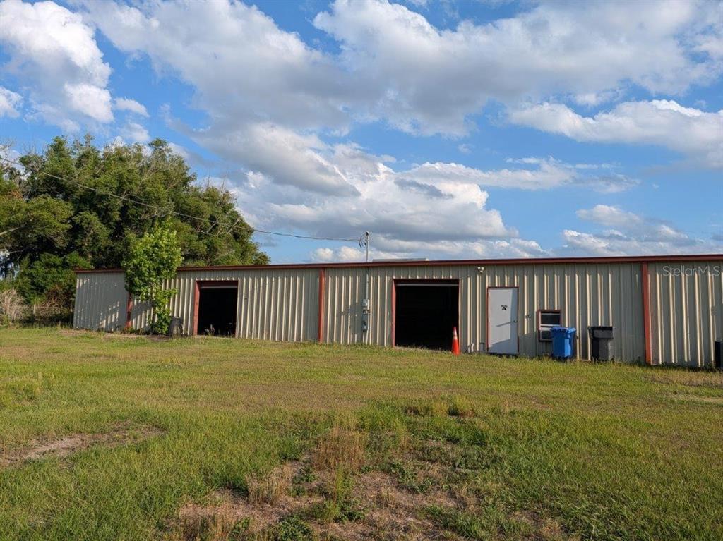 4402 Gallagher Road Plant City, FL 33565 - Photo 41 of 42 a view of a house with a yard