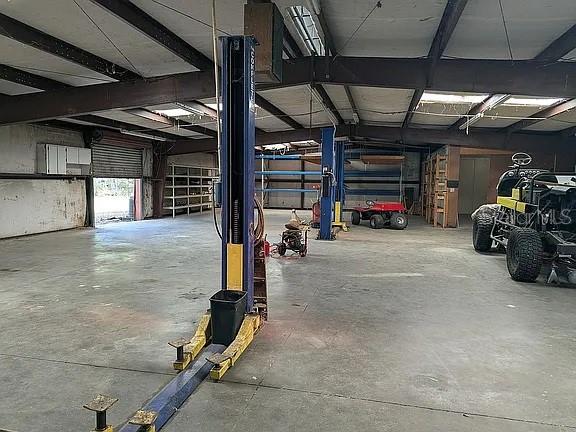 4402 Gallagher Road Plant City, FL 33565 - Photo 6 of 42 a view of a room with gym equipment