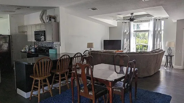 a view of a workspace with furniture