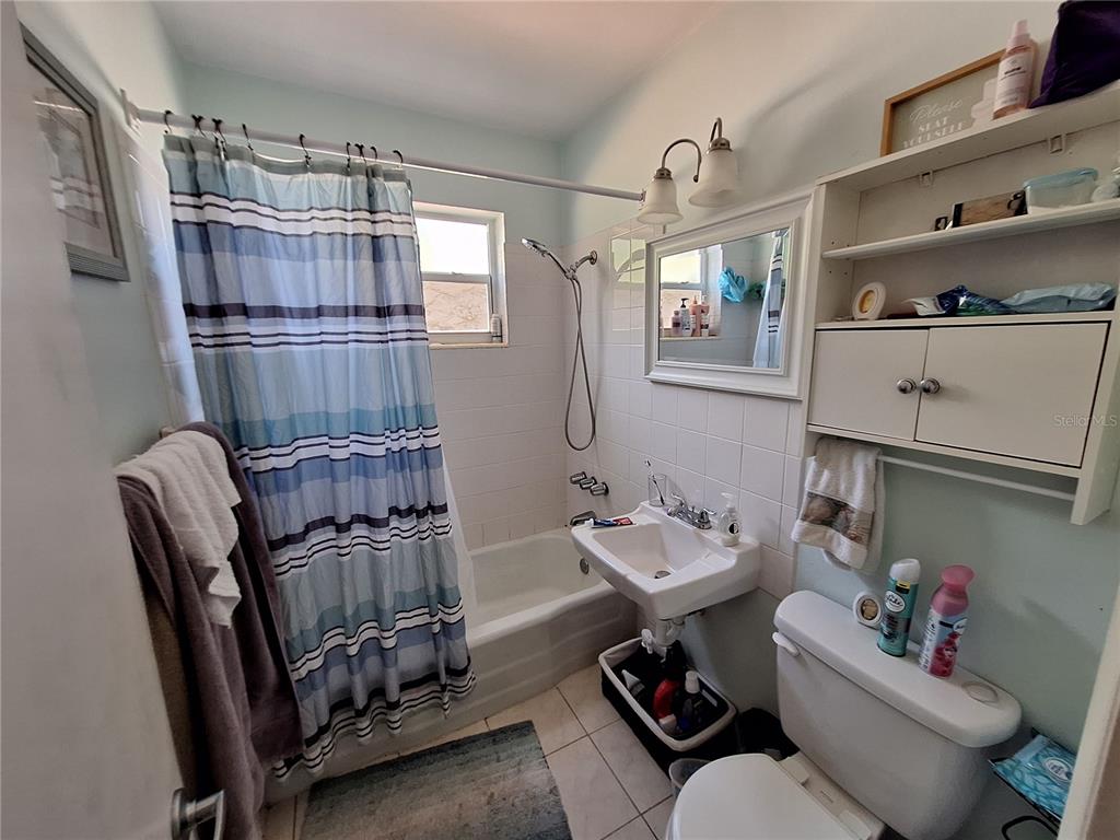 8564 Agress Avenue North Port, FL 34287 - Photo 9 of 18 a reading room with furniture window and wooden floor