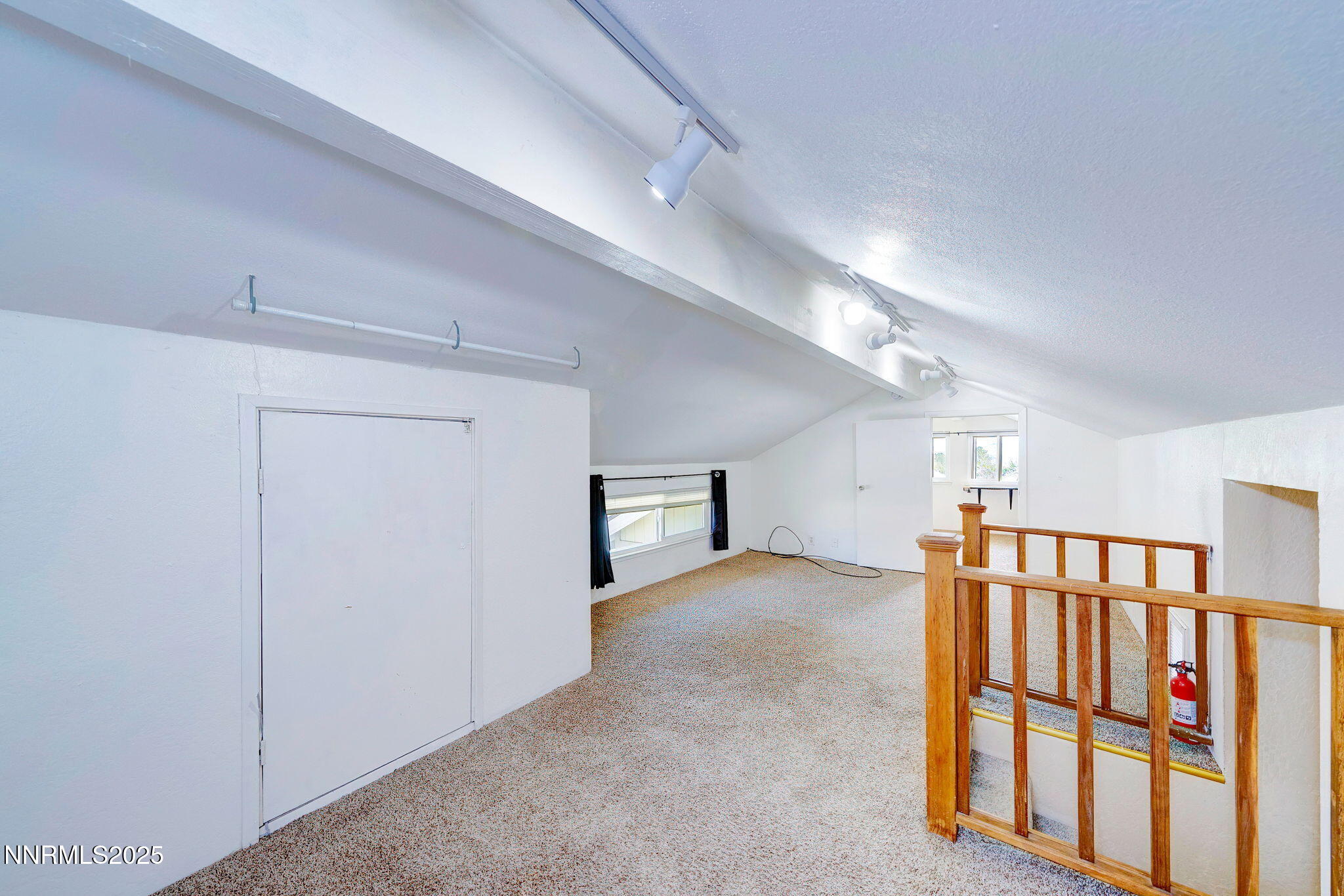1210 Conway Lane, Unit 1210 Reno, NV 89503 - Photo 21 of 31 a view of an empty room with stairs