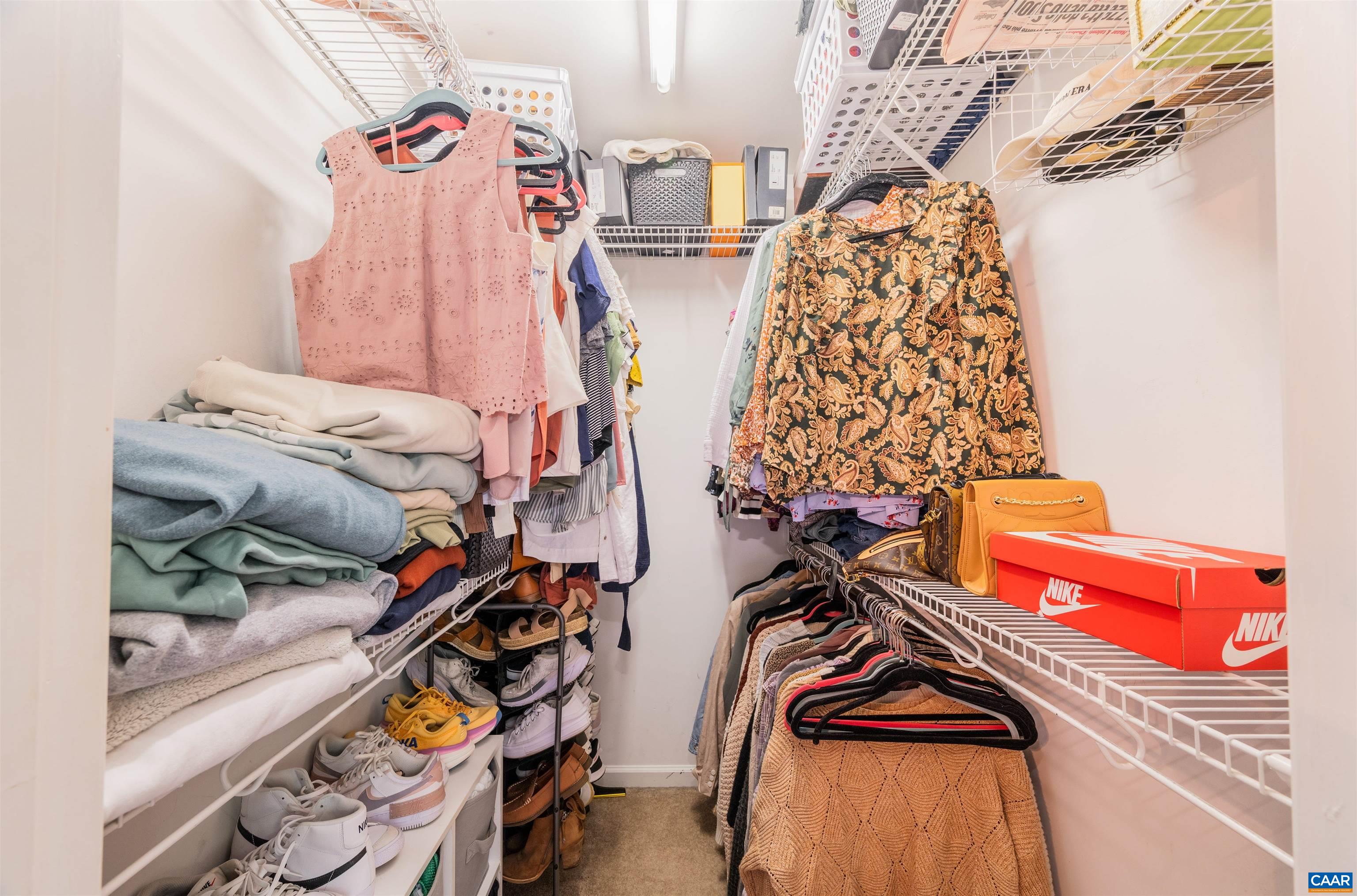 31 Zephyr Road Palmyra, VA 22963 - Photo 26 of 44 a view of walk in closet with clothes and shoes
