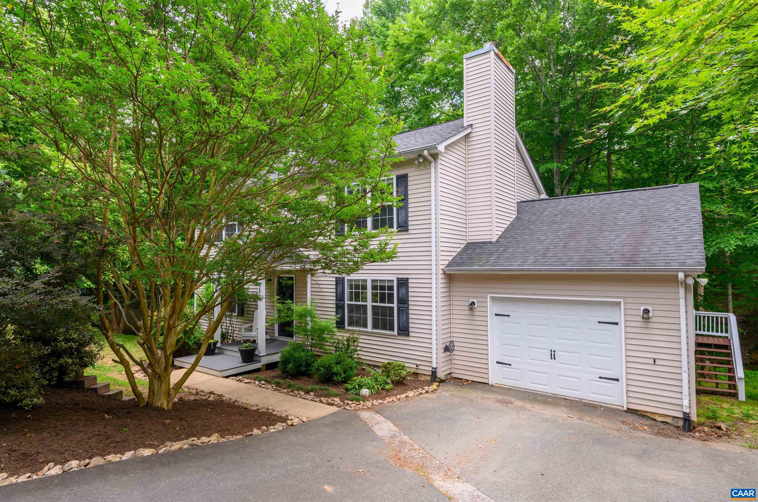 31 Zephyr Road Palmyra, VA 22963 - Photo 39 of 44 a view of a house with a yard and garage