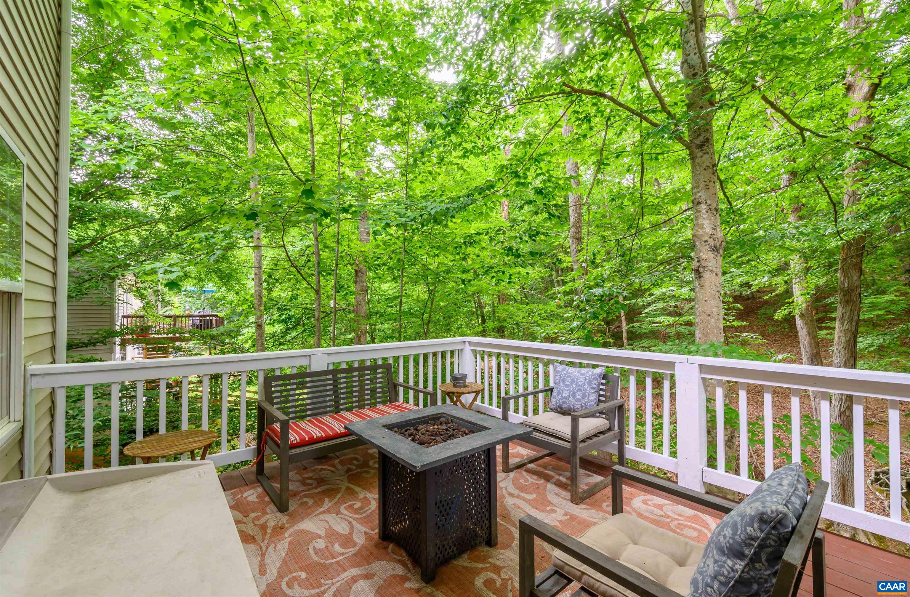 31 Zephyr Road Palmyra, VA 22963 - Photo 9 of 44 a view of a wooden deck with a bench