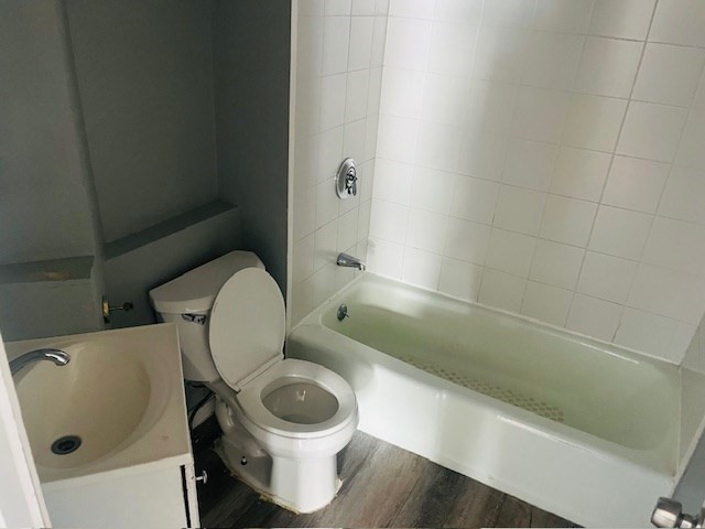 32 Newcomb Place, Unit 2 Taunton, MA 02780 - Photo 5 of 8 a bathroom with a toilet and a sink