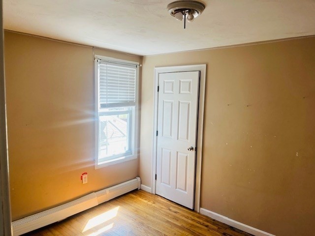 32 Newcomb Place, Unit 2 Taunton, MA 02780 - Photo 6 of 8 an empty room with windows