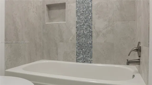 a bathroom with a bathtub