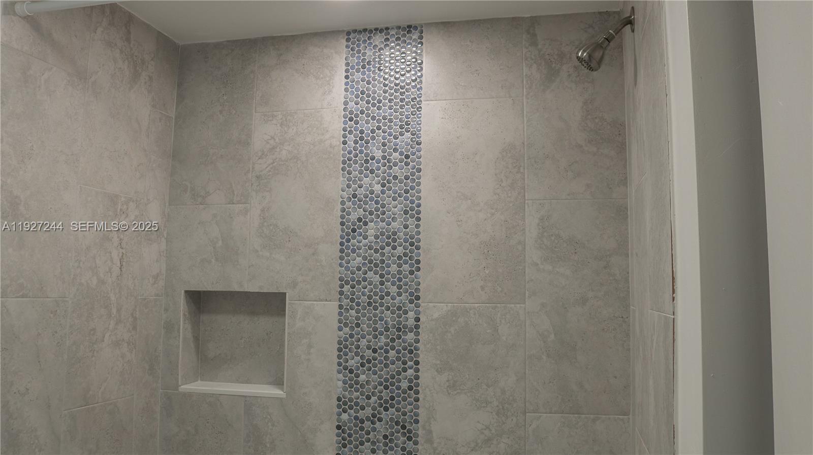 9421 Evergreen Place, Unit 103 Davie, FL 33324 - Photo 15 of 32 a bathroom with a shower