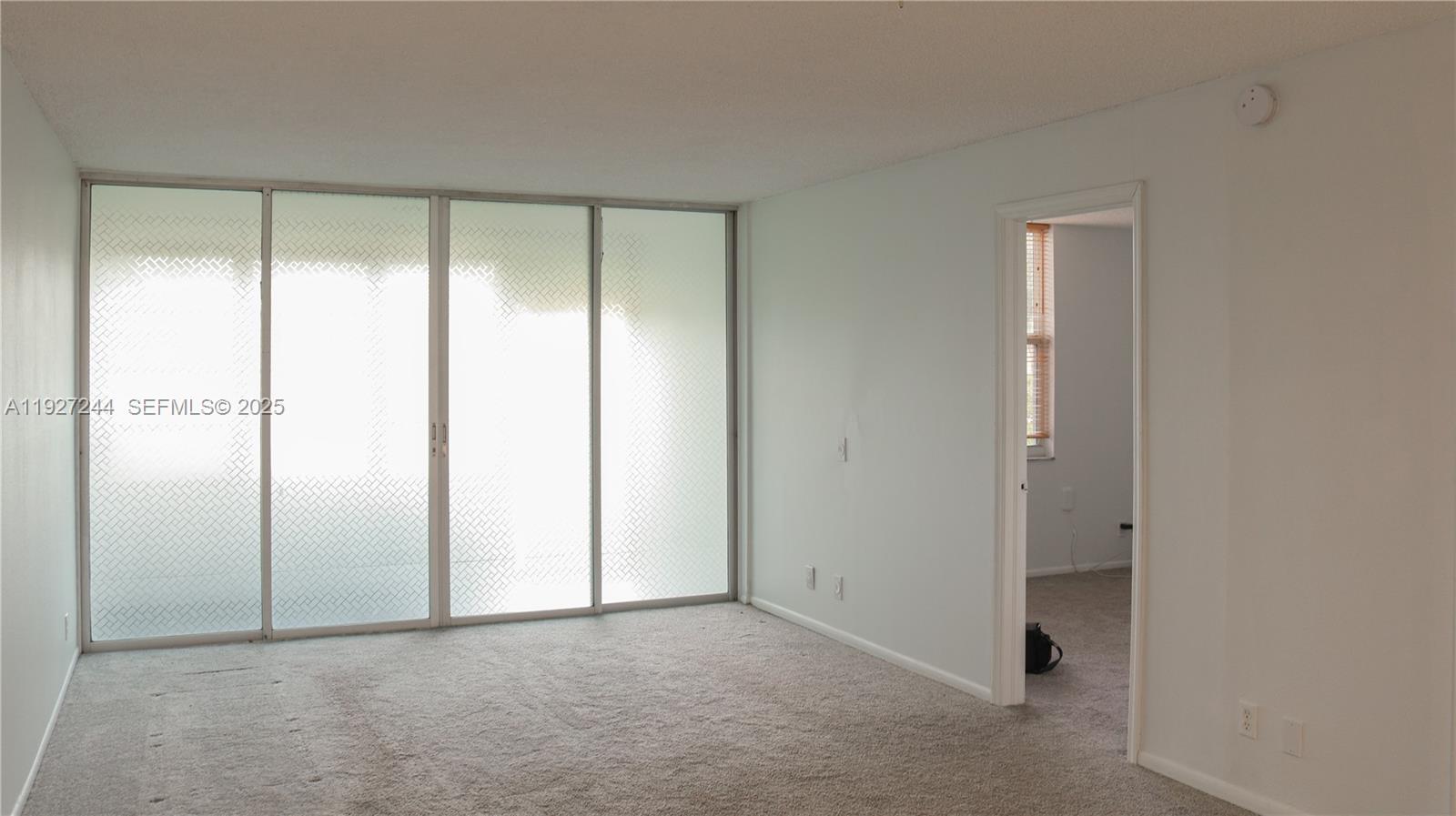 9421 Evergreen Place, Unit 103 Davie, FL 33324 - Photo 2 of 32 a view of an empty room
