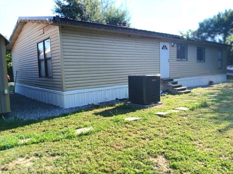 9153 Bouncer Road Quinlan, TX 75474 - Photo 21 of 27 a view of a backyard with plants