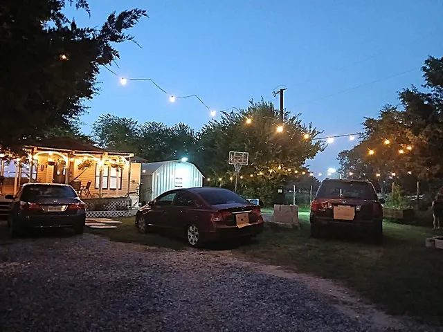 a view of a park with swings and slides