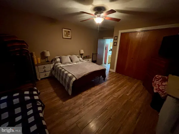 a bed room with a bed and a couch