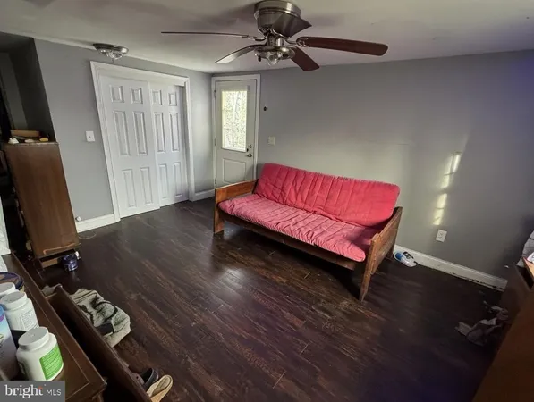 a view of a dining room with furniture and window