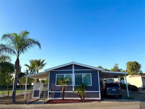 a front view of a house with a porch