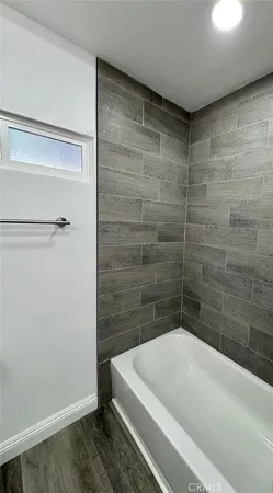 a bathroom with a bathtub
