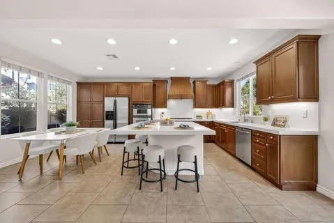 a view of entryway with wooden floor and a front door