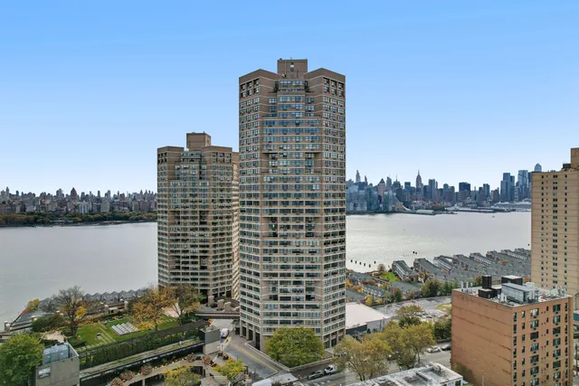 a view of a city with tall buildings