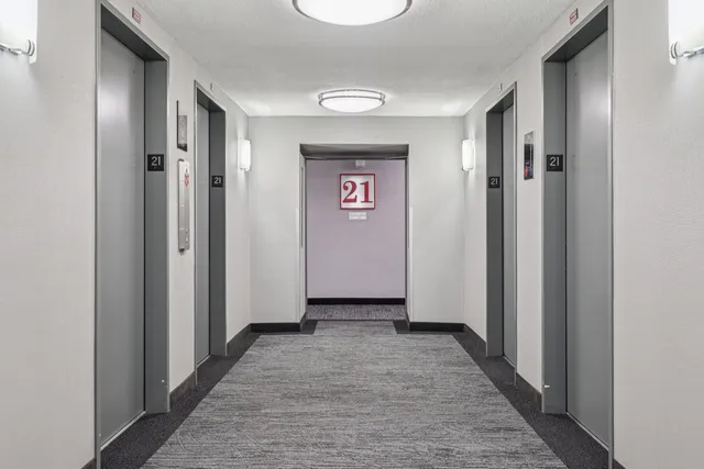 a view of a lake with a building in the background