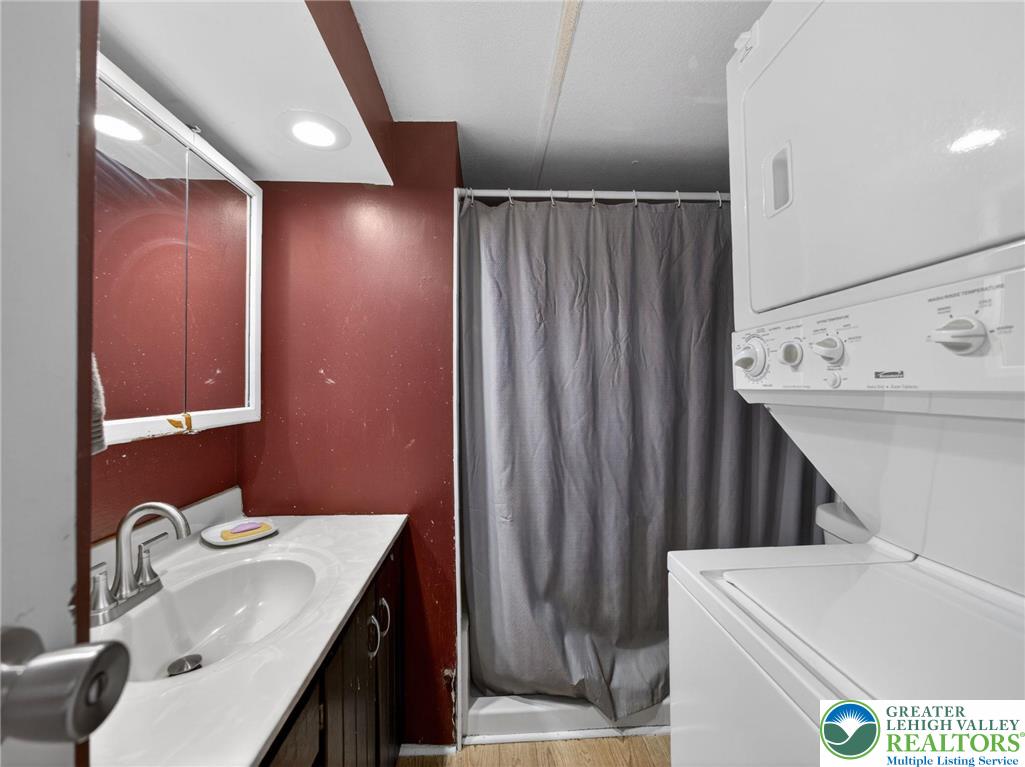23 Roth Avenue Mertztown, PA 19539 - Photo 9 of 29 a bathroom with a sink vanity granite tub and shower