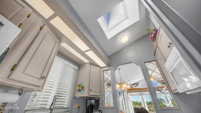 a view of a balcony with chairs