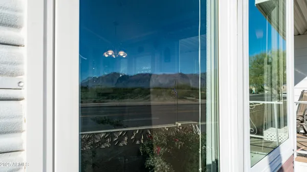 a swimming pool with outdoor seating and deck view