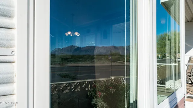 a swimming pool with outdoor seating and deck view