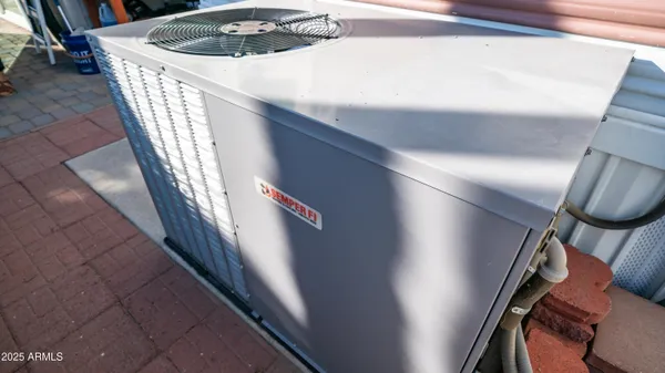 a view of a room and wooden fence