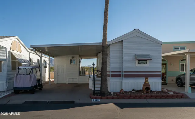 a front view of house with street