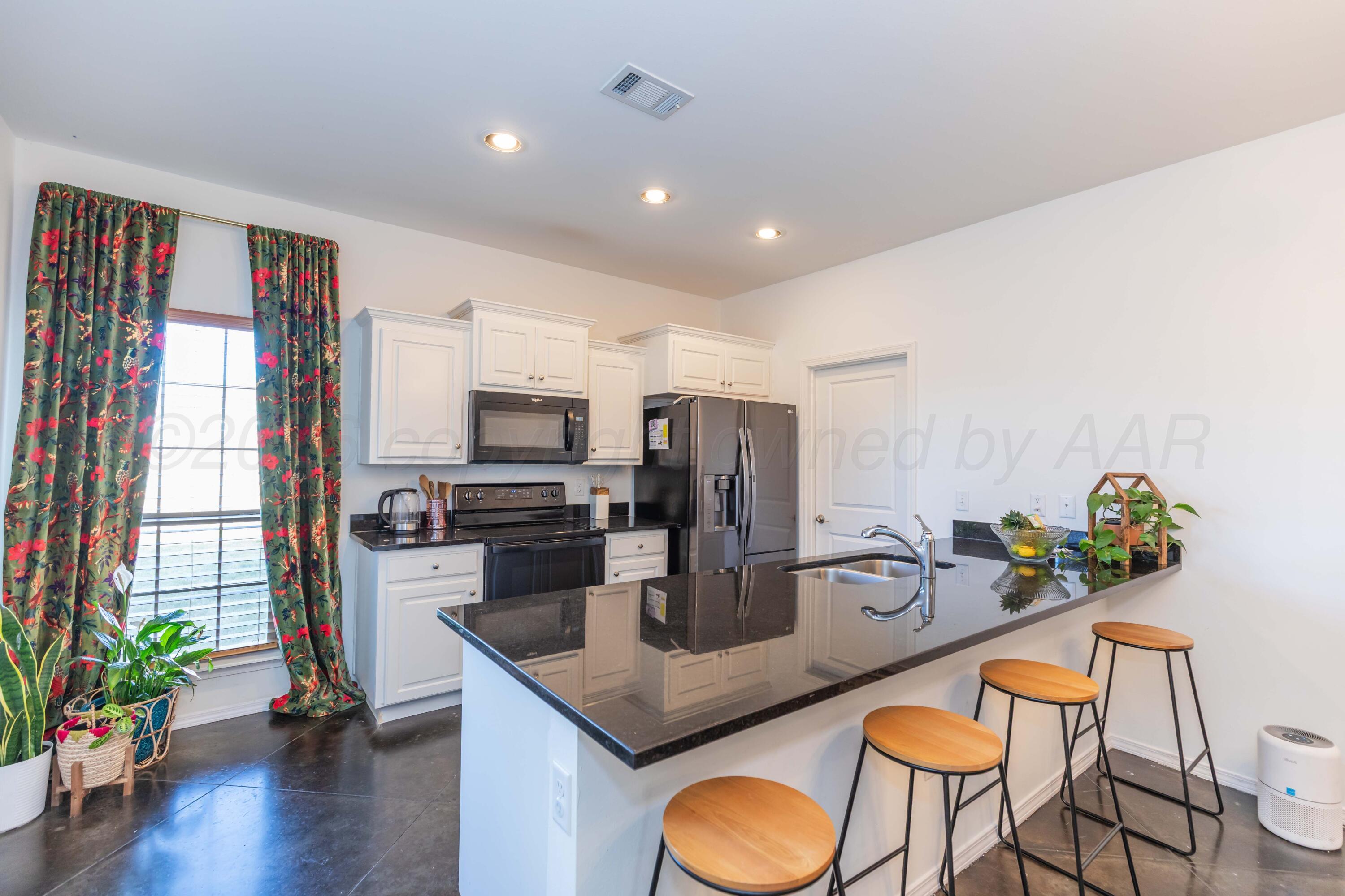 5002 Longbird Street Amarillo, TX 79118 - Photo 9 of 36 KITCHEN VIEW 1