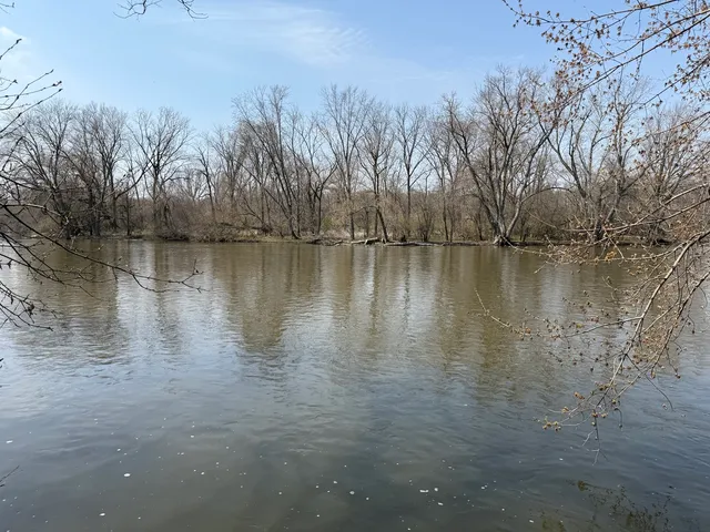 a view of a lake with houses in outdoor space