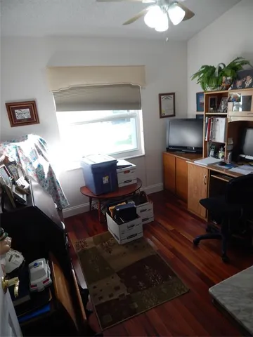 a workspace with furniture and window