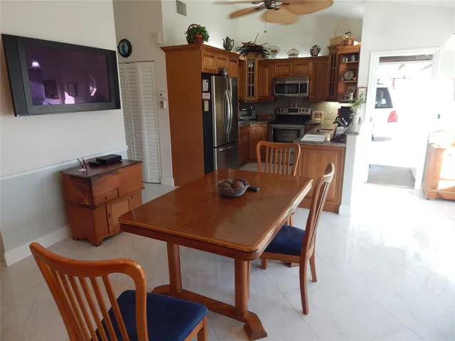 a view of a dining room with furniture