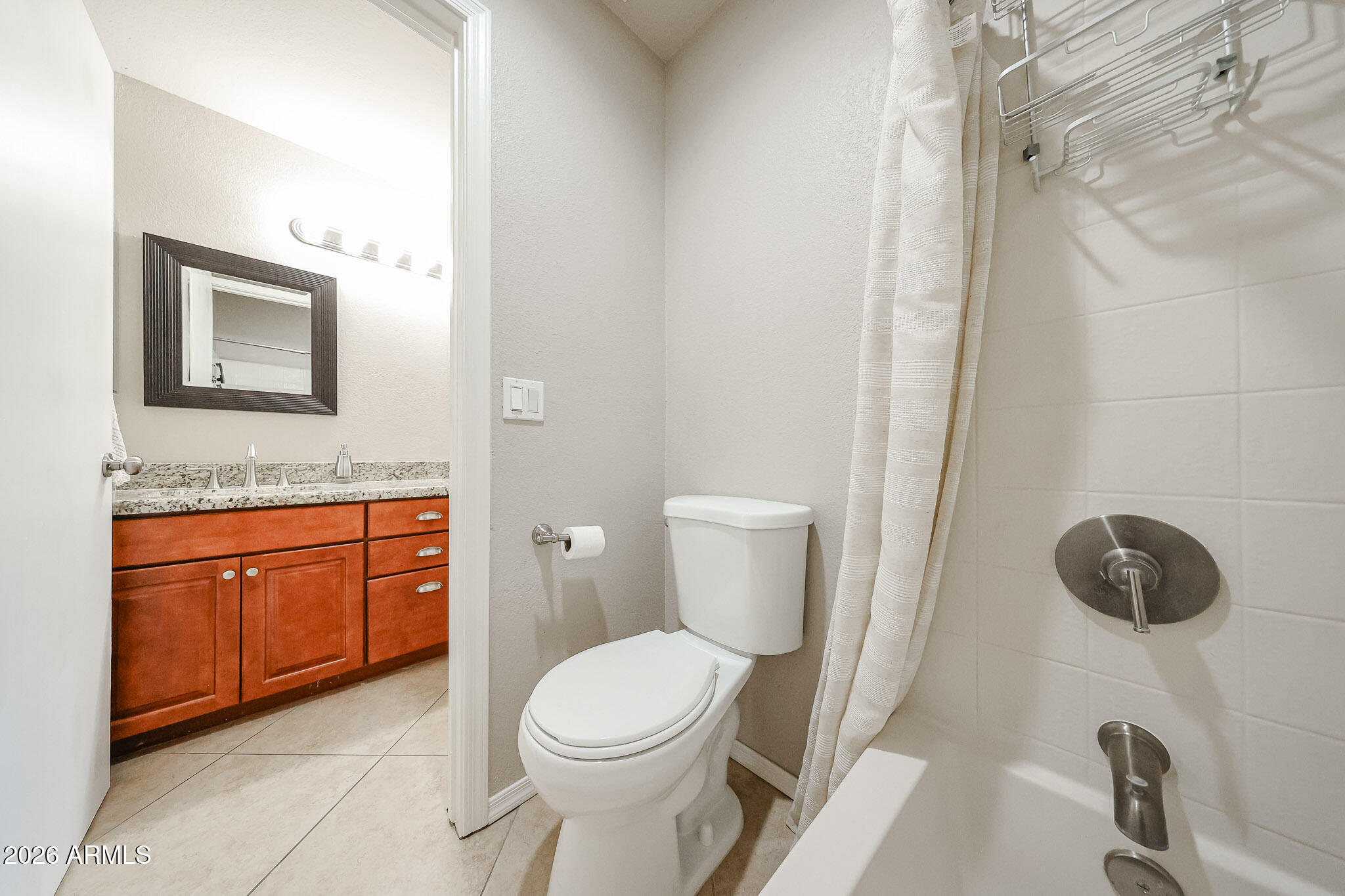 860 North McQueen Road, Unit 1145 Chandler, AZ 85225 - Photo 26 of 63 a bathroom with a granite countertop sink toilet and shower