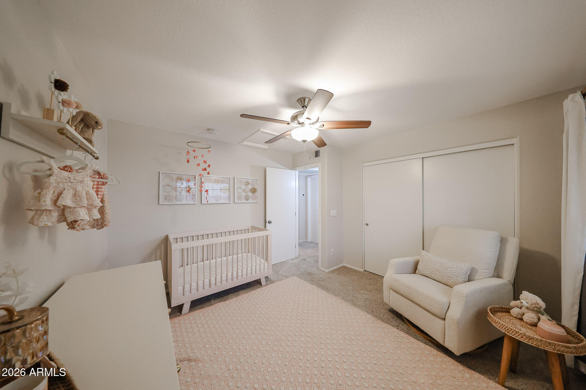860 North McQueen Road, Unit 1145 Chandler, AZ 85225 - Photo 33 of 63 a living room with furniture and a chandelier