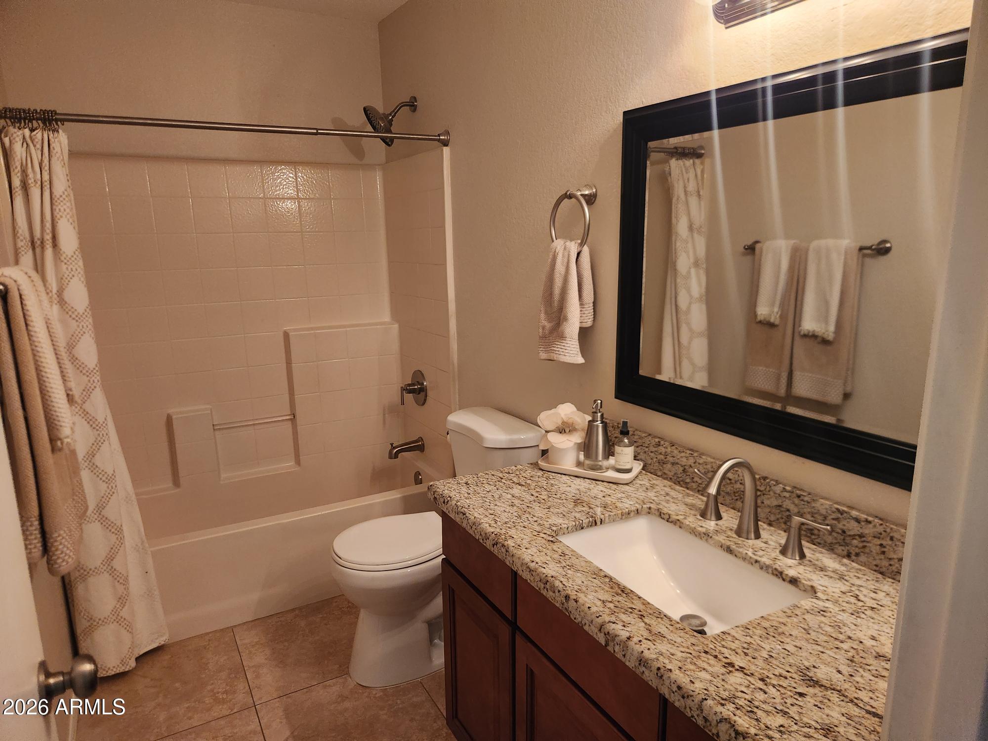 860 North McQueen Road, Unit 1145 Chandler, AZ 85225 - Photo 44 of 63 a bathroom with a granite countertop sink toilet and shower