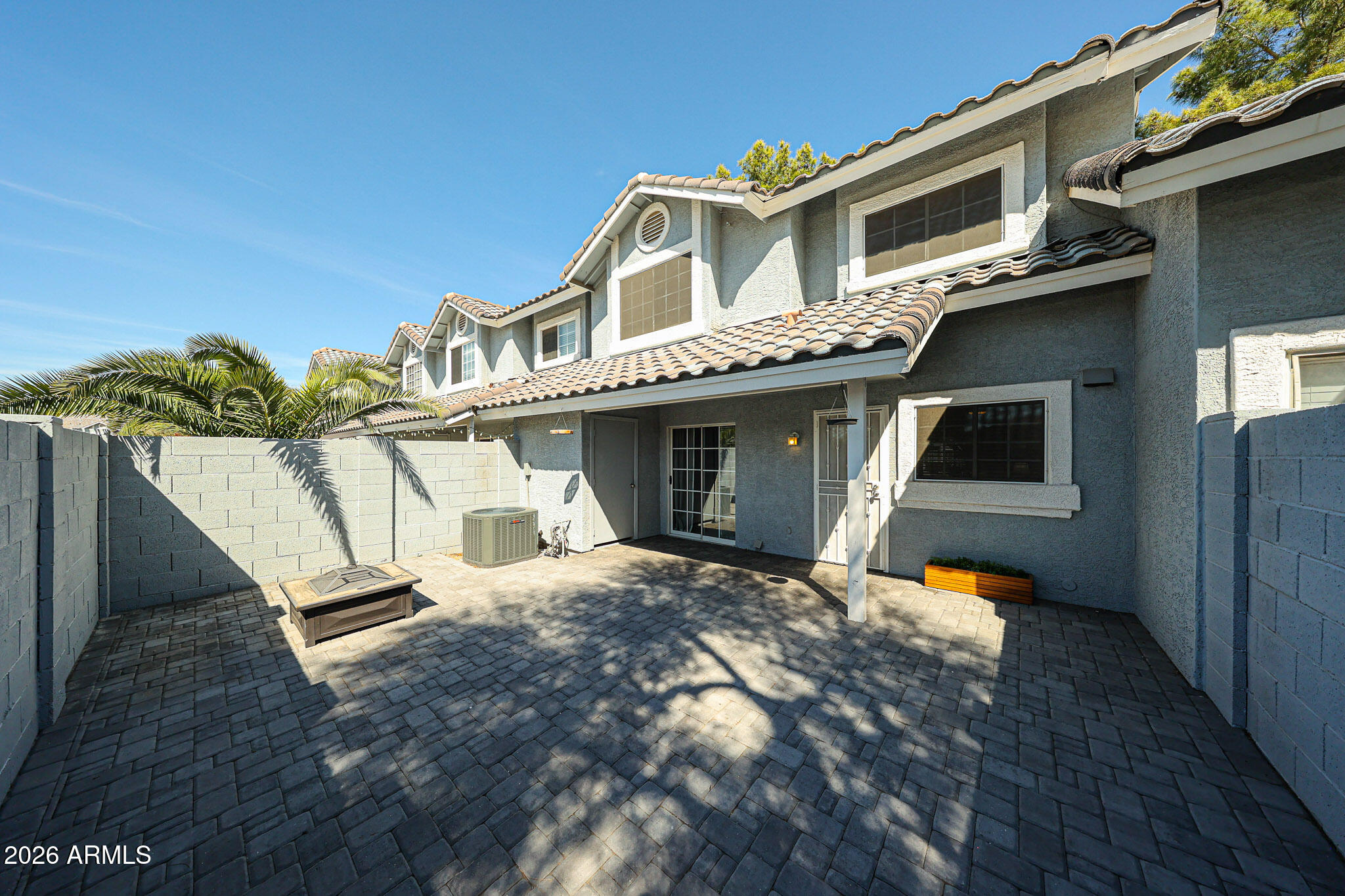 860 North McQueen Road, Unit 1145 Chandler, AZ 85225 - Photo 47 of 63 a front view of a house with a yard