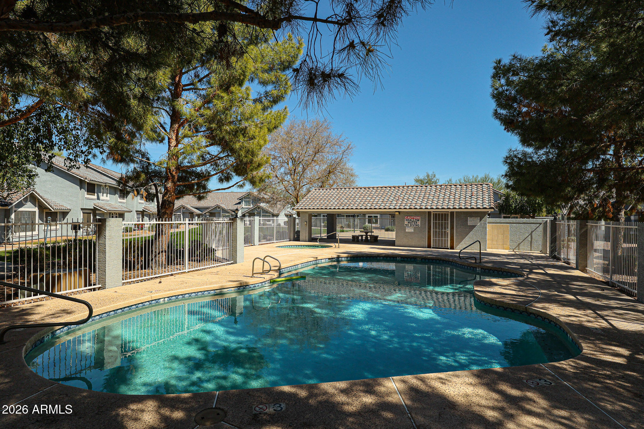 860 North McQueen Road, Unit 1145 Chandler, AZ 85225 - Photo 55 of 63 a view of a house with pool and sitting area