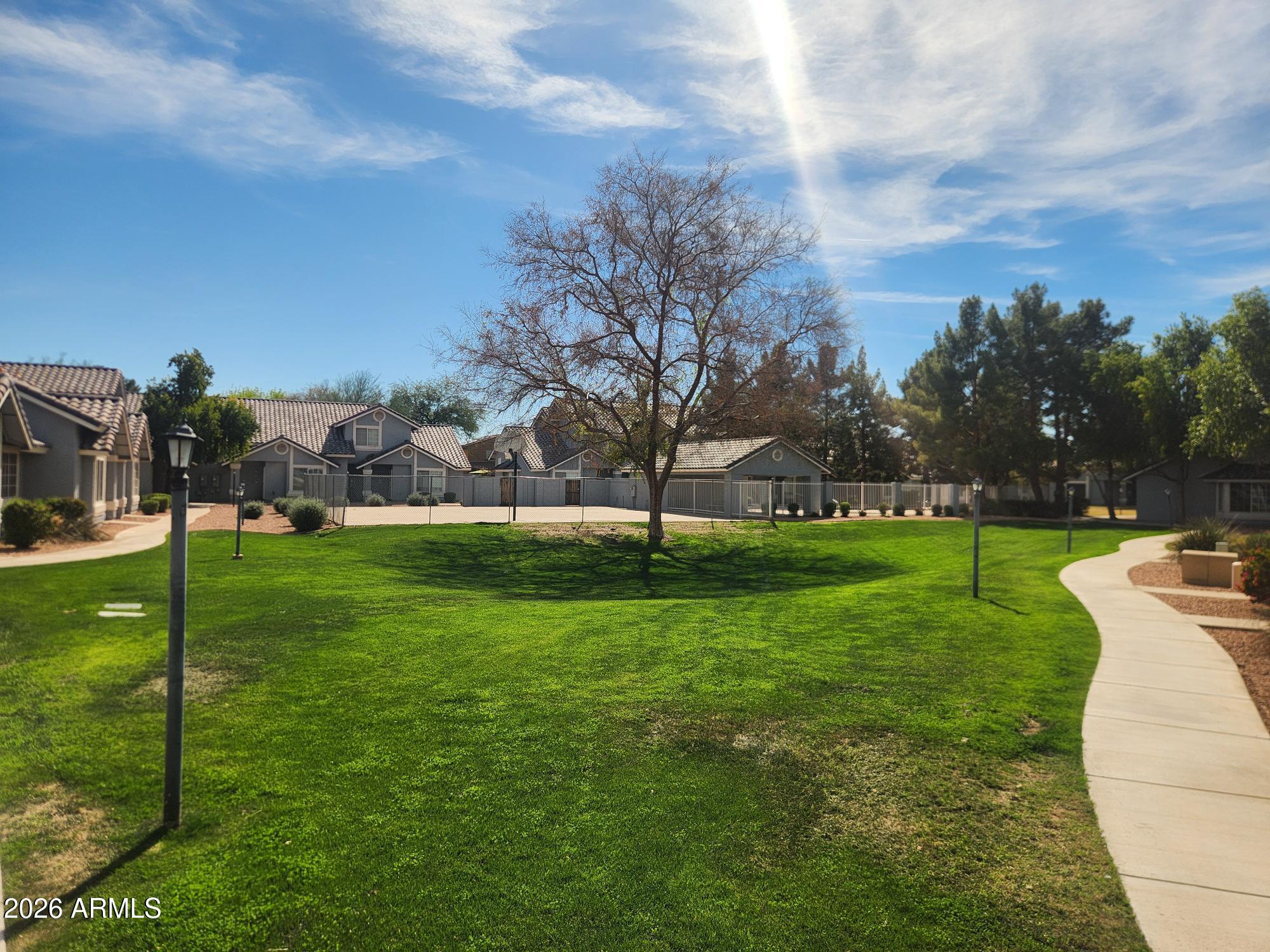 860 North McQueen Road, Unit 1145 Chandler, AZ 85225 - Photo 59 of 63 a view of a park with large trees