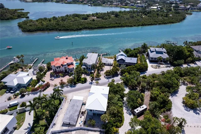 an aerial view of a houses with outdoor space