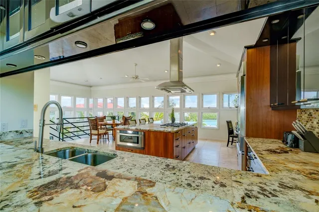 a bedroom with two beds and a large window