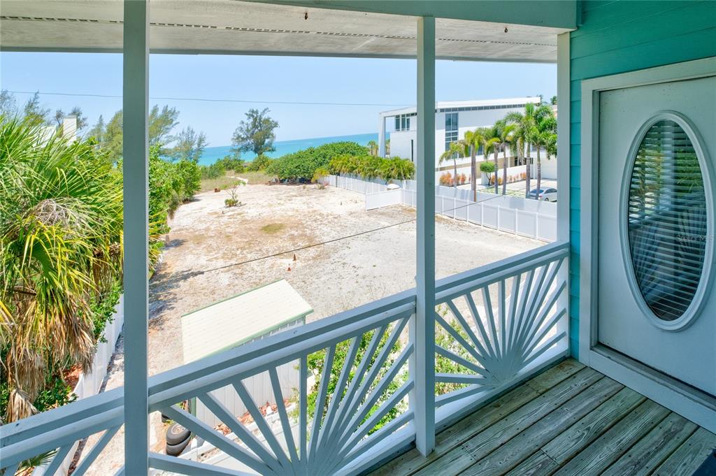 624 South Casey Key Road Nokomis, FL 34275 - Photo 34 of 75 a view of a balcony with wooden floor