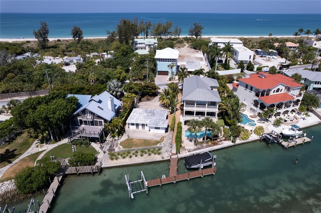 624 South Casey Key Road Nokomis, FL 34275 - Photo 73 of 75 an aerial view of multiple houses with a city