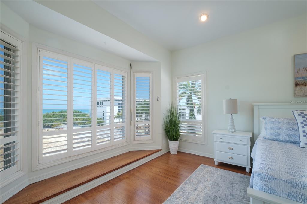 624 South Casey Key Road Nokomis, FL 34275 - Photo 8 of 75 a living room with furniture and a large window