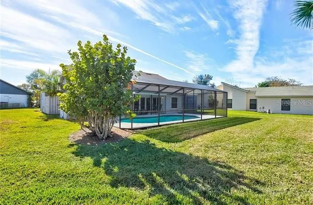 a view of a swimming pool with a porch