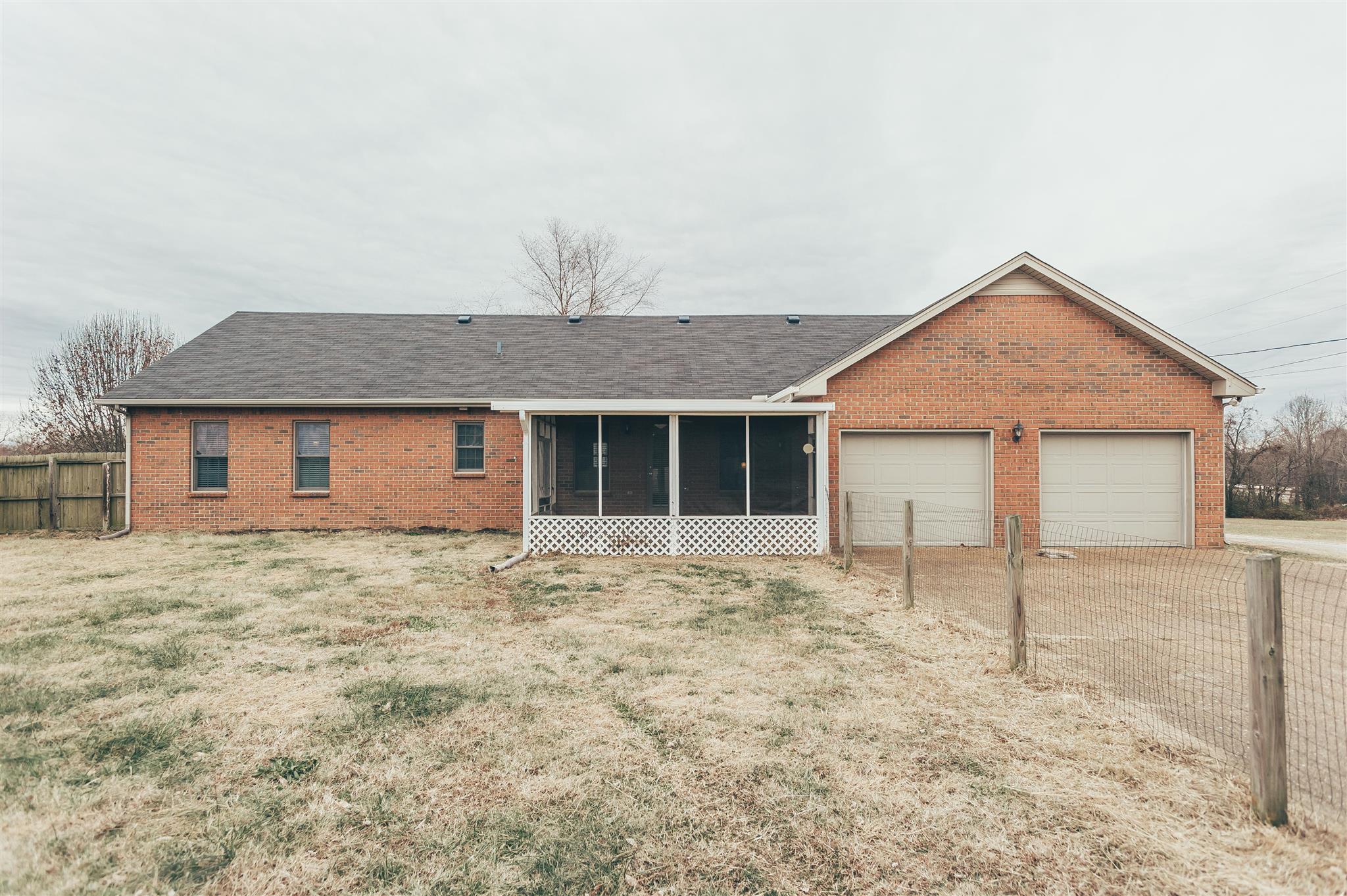 2920 Academy Road Portland, TN 37148 - Photo 5 of 26 Attached 2 car garage with screened in porch.