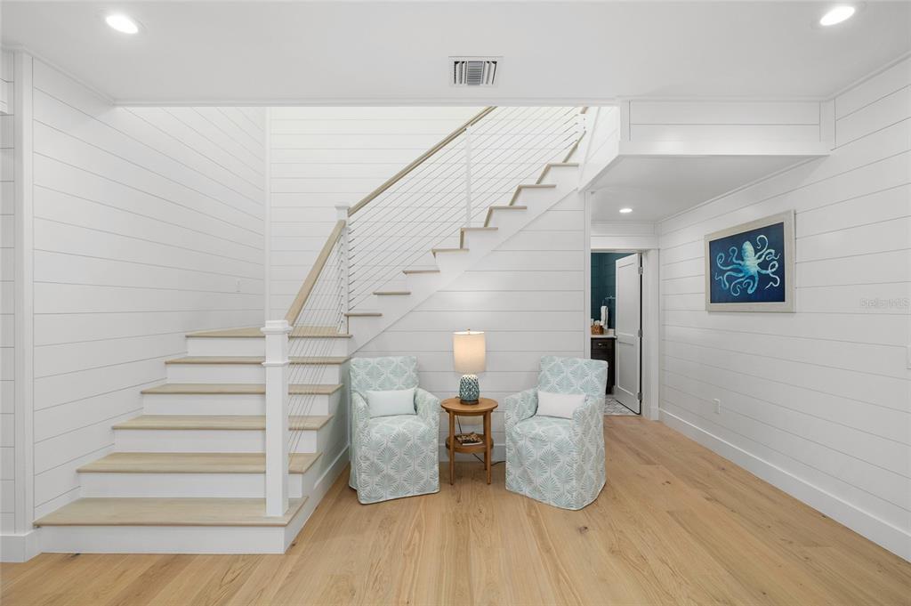 180 Damfiwill Street Boca Grande, FL 33921 - Photo 12 of 83 a view of entryway and hall with wooden floor