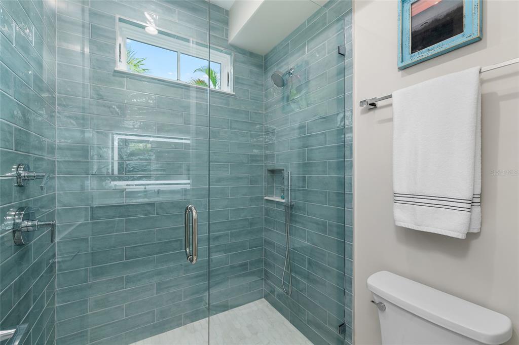 180 Damfiwill Street Boca Grande, FL 33921 - Photo 60 of 83 a bathroom with a toilet and a shower